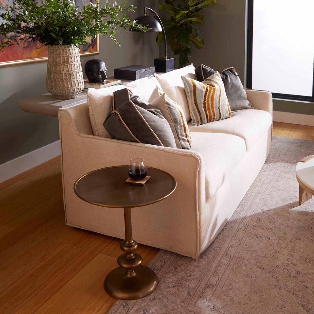cream slipcovered small 2 cushion sofa