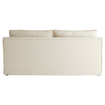 cream slipcovered small 2 cushion sofa