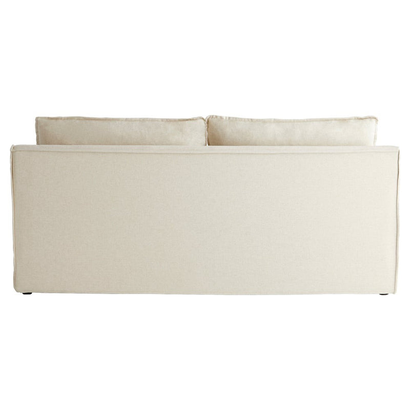 cream slipcovered small 2 cushion sofa