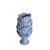periwinkle blue vase overlapping leaves