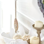 large white plaster clam shell