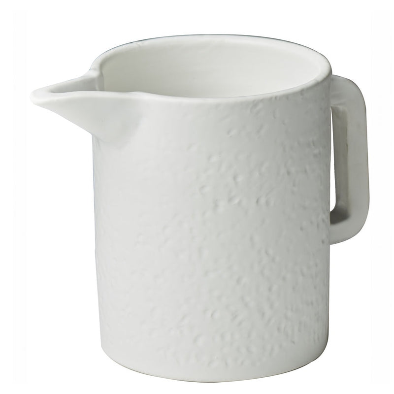 matte white dimpled ceramic pitcher