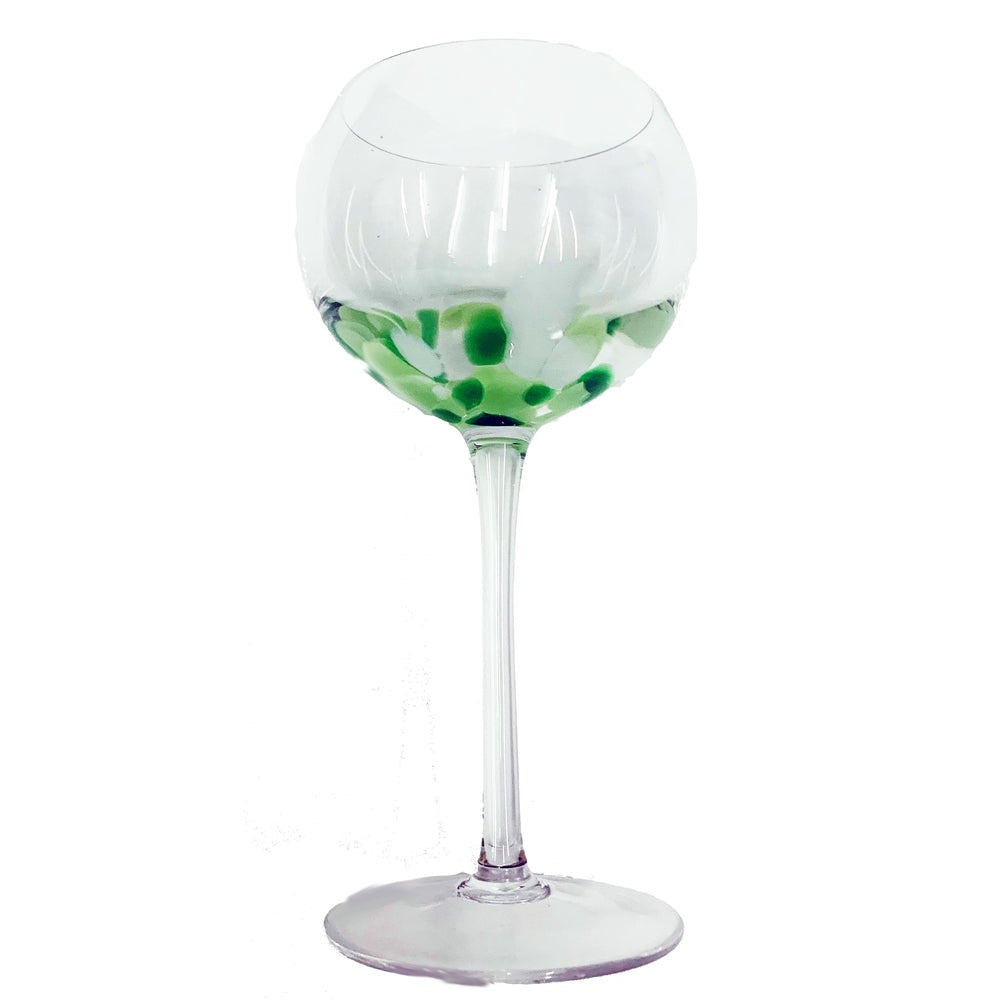 clear stemmed wine glasses green white drops