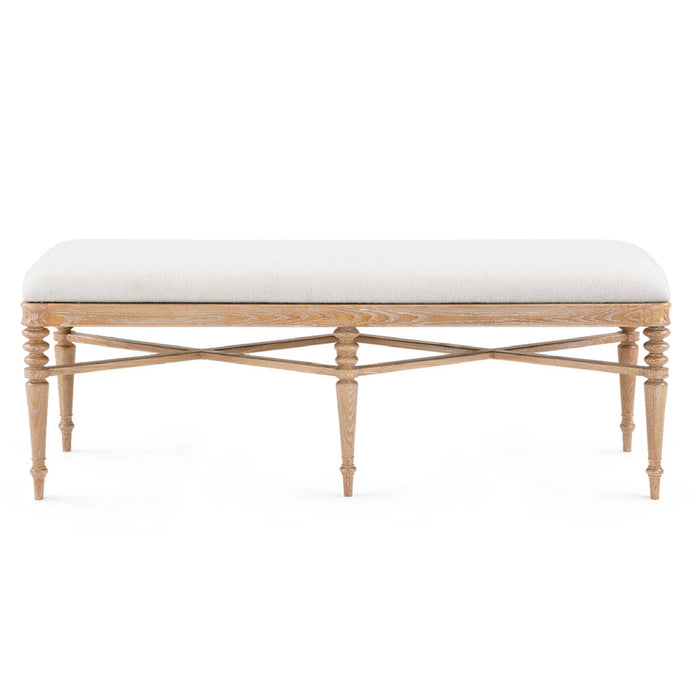 The Lawrence Almond Cerused Oak Bench by Villa & House features turned legs, cross stretchers, and a light upholstered seat.