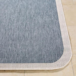 area rug machine woven blue cream edge rounded