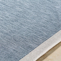 area rug machine woven blue cream edge rounded