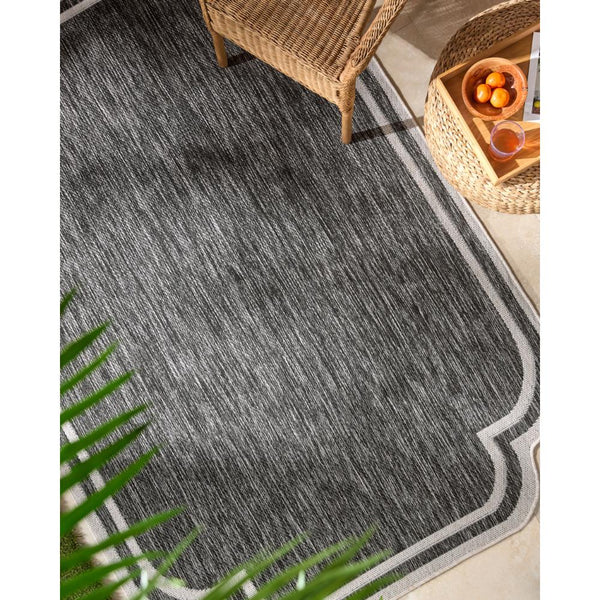 area rug machine woven black white scalloped edge