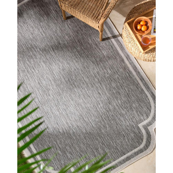 area rug machine woven charcoal white scalloped edge