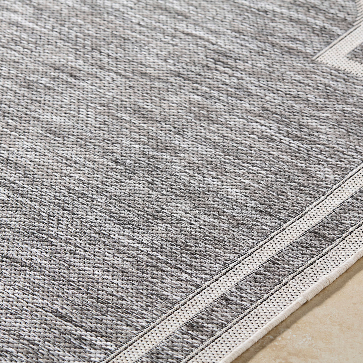 area rug machine woven charcoal white scalloped edge