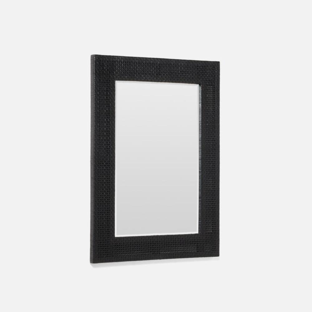 Black rectangular mirror with textured frame on a white background