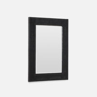 Black rectangular mirror with textured frame on a white background