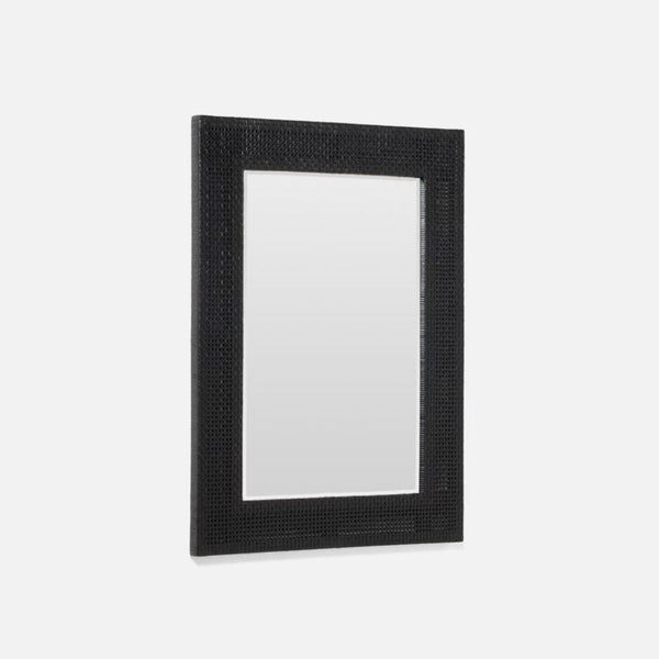 Black rectangular mirror with textured frame on a white background