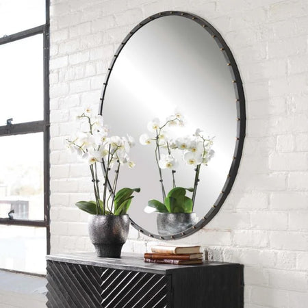round black dotted wall mirror