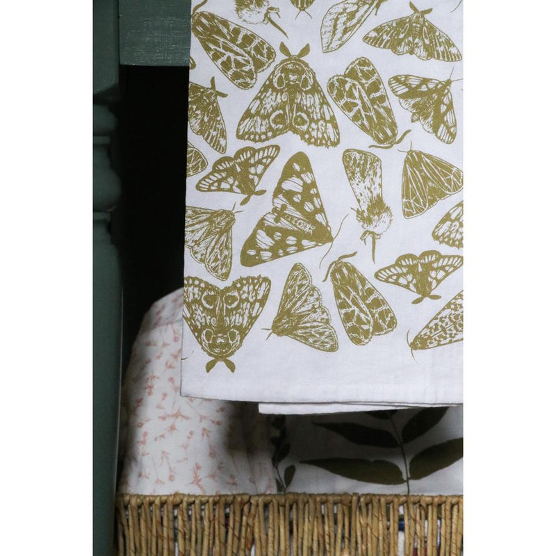 white flour sack tea towel green yellow printed moths
