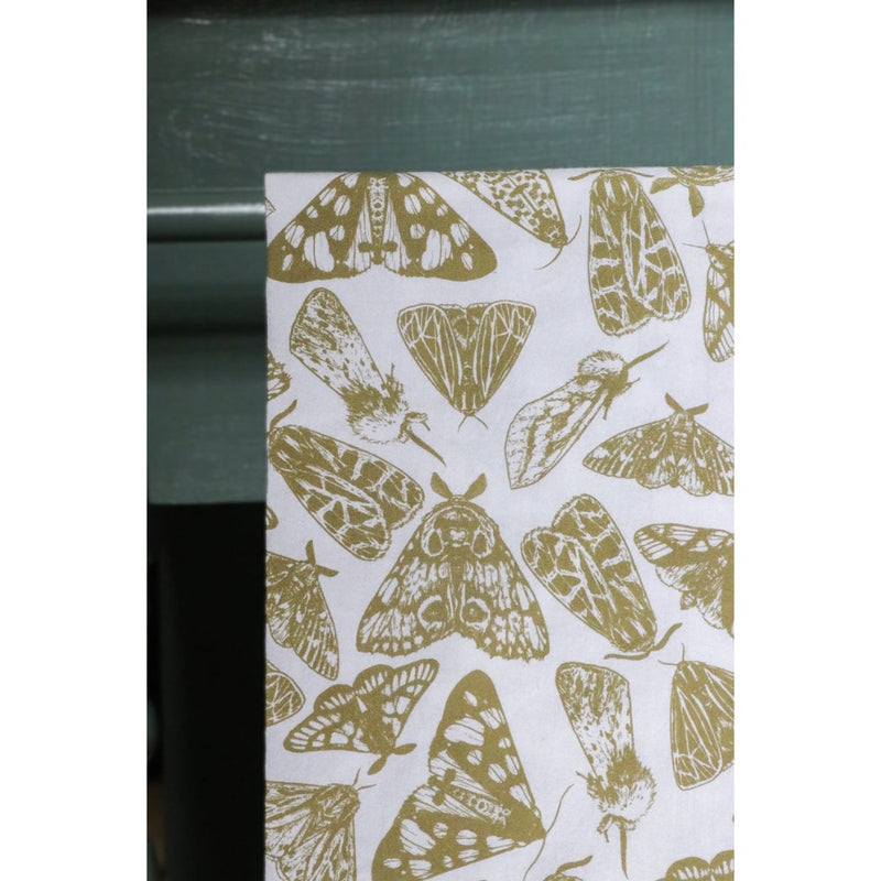 white flour sack tea towel green yellow printed moths