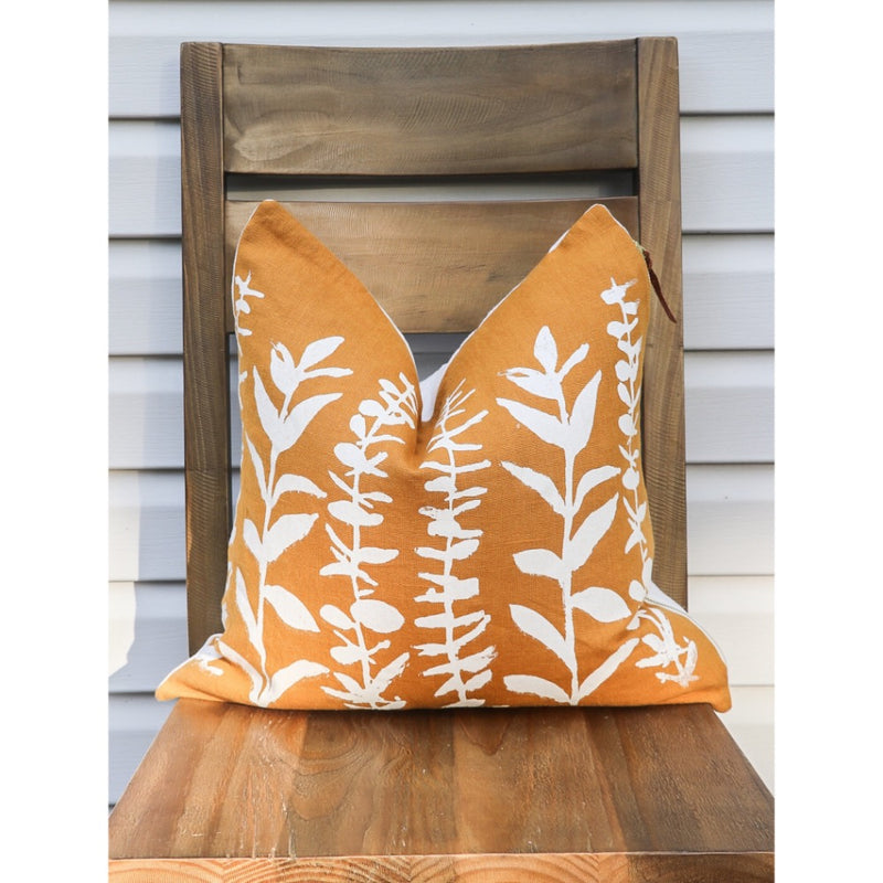 square pillow mustard linen white eucalyptus branches 