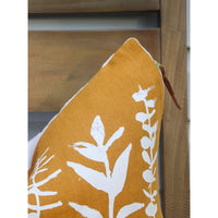 square pillow mustard linen white eucalyptus branches 