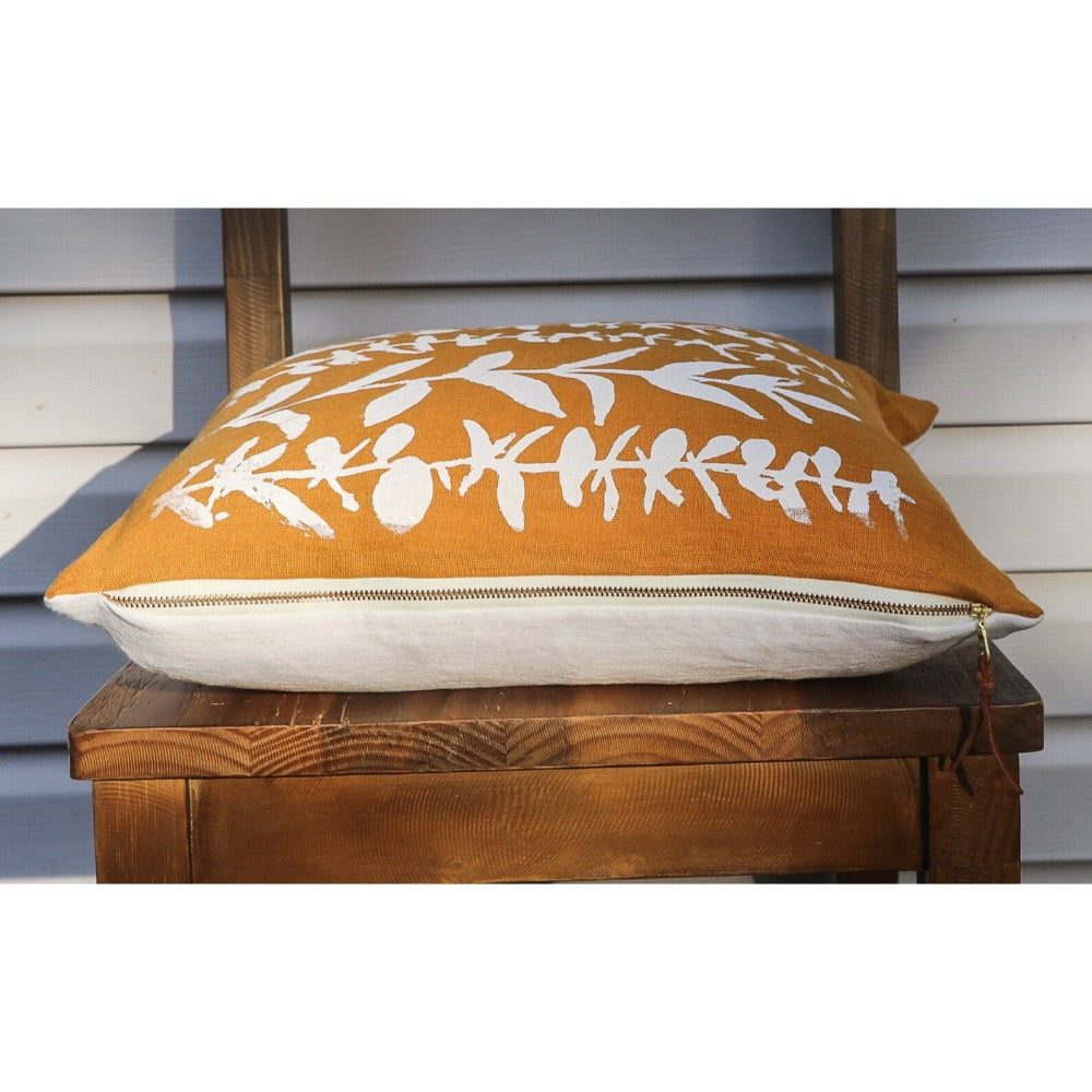 square pillow mustard linen white eucalyptus branches 