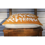 square pillow mustard linen white eucalyptus branches 