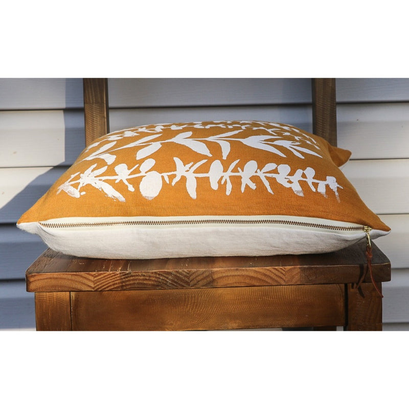 square pillow mustard linen white eucalyptus branches 