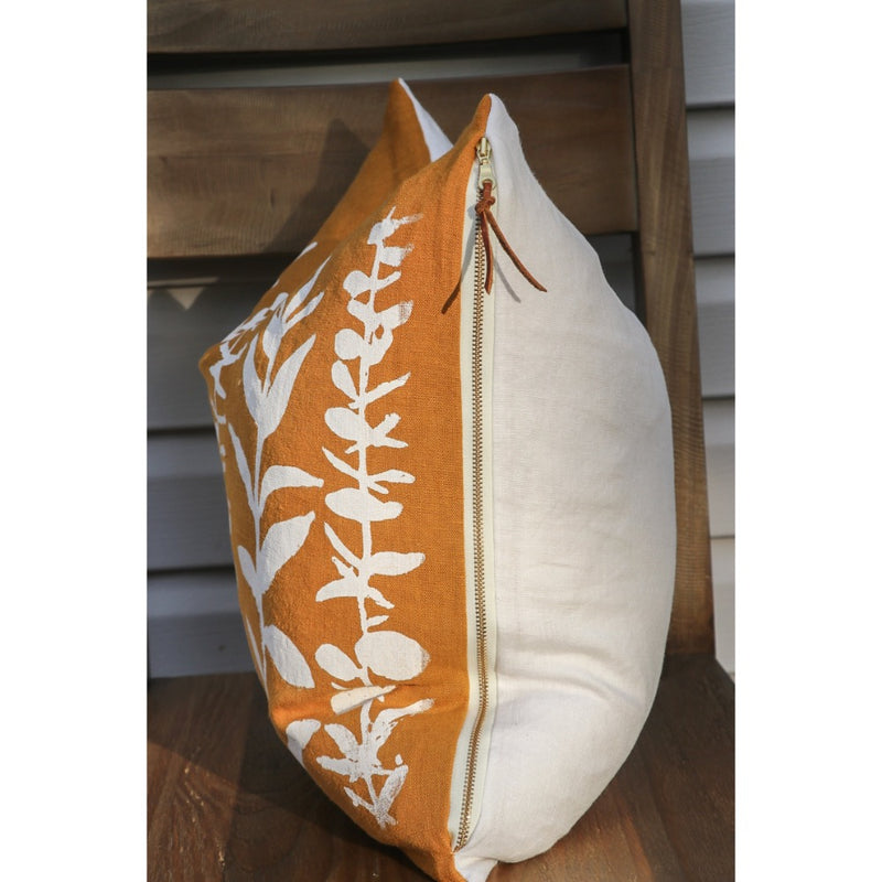 square pillow mustard linen white eucalyptus branches 
