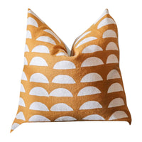 A square, block-printed throw pillow from Muse Textiles featuring a mustard yellow and white half-circle pattern on a white background, perfect as the Mustard + White Half Circles Accent Pillow.