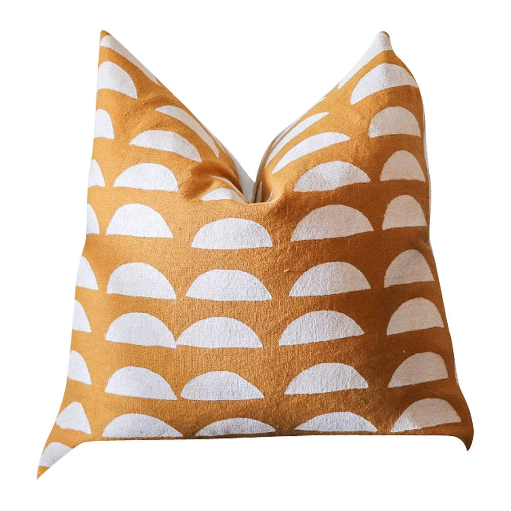 A square, block-printed throw pillow from Muse Textiles featuring a mustard yellow and white half-circle pattern on a white background, perfect as the Mustard + White Half Circles Accent Pillow.