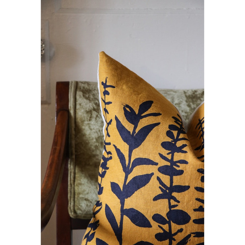square pillow mustard linen navy eucalyptus branches 