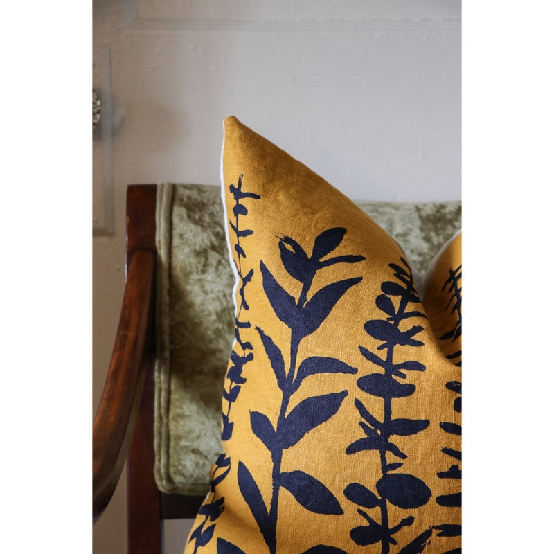 square pillow mustard linen navy eucalyptus branches 