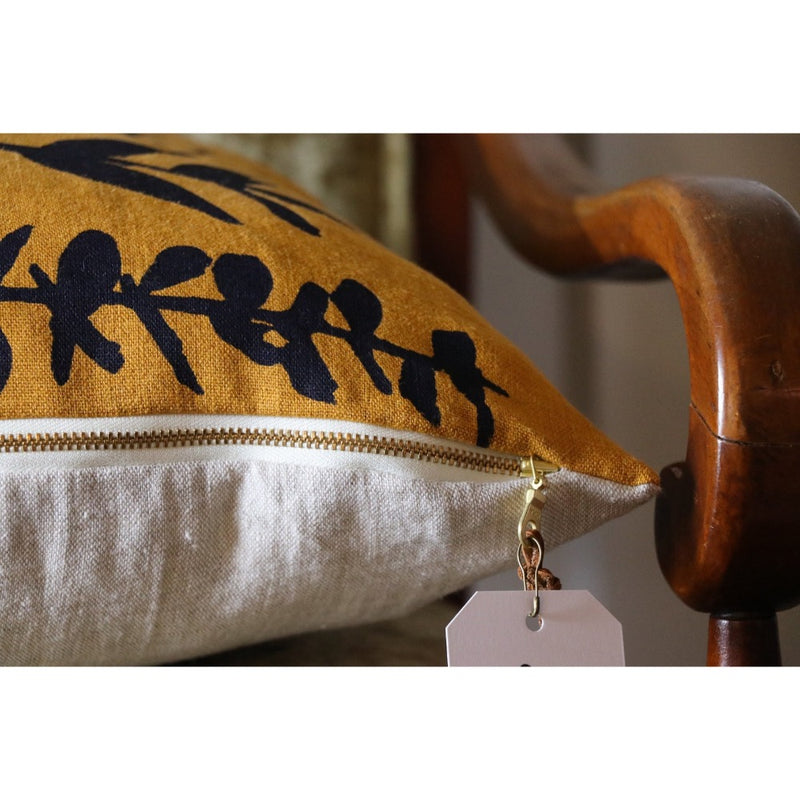 square pillow mustard linen navy eucalyptus branches 
