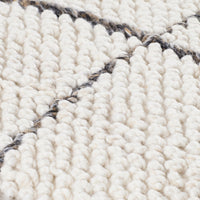square woven off-white accent pillow black window-pane pattern