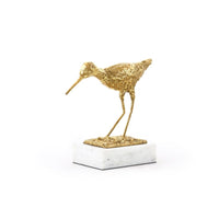 white marble base gold sculpture sandpiper bird