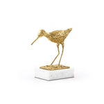 white marble base gold sculpture sandpiper bird