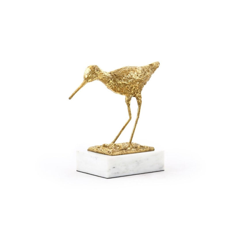 white marble base gold sculpture sandpiper bird