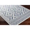 cream navy diamond patterned rug