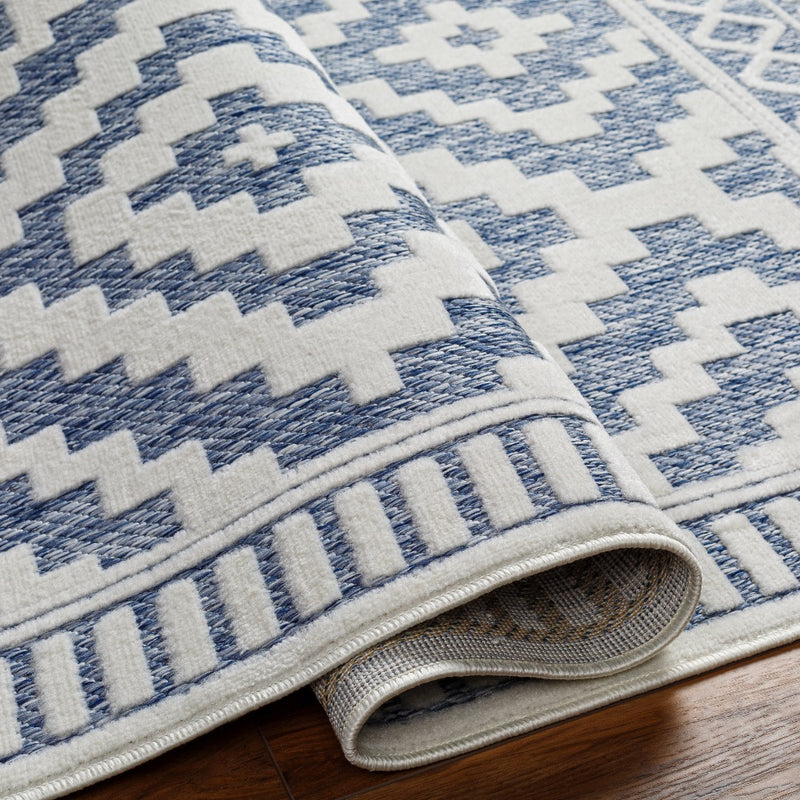 cream navy diamond patterned rug