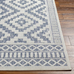 cream navy diamond patterned rug