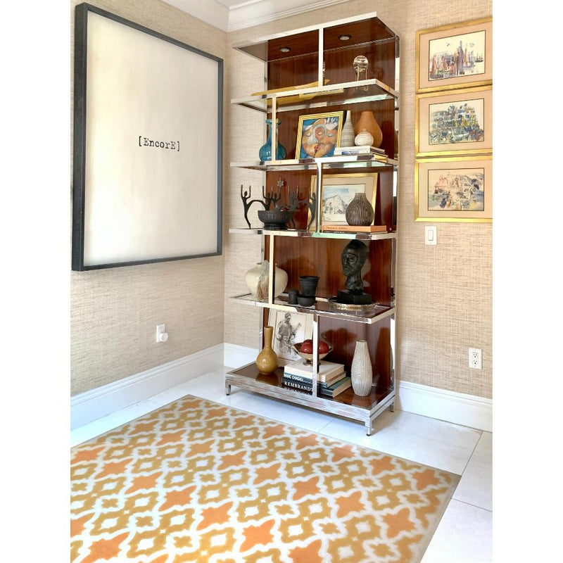 Vinyl Floorcloth in room with chrome bookcase and artwork