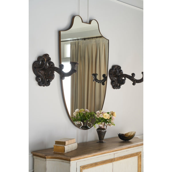 shield shaped mirror antique brass frame