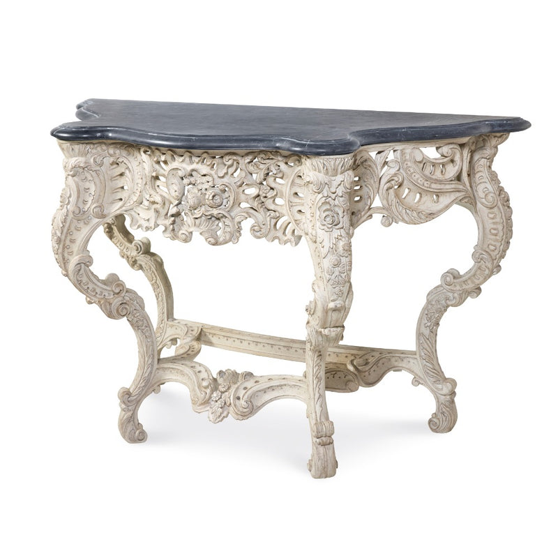 console table French inspired carved base curved legs ivory dark wood top