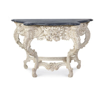 console table French inspired carved base curved legs ivory dark wood top