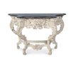 console table French inspired carved base curved legs ivory dark wood top
