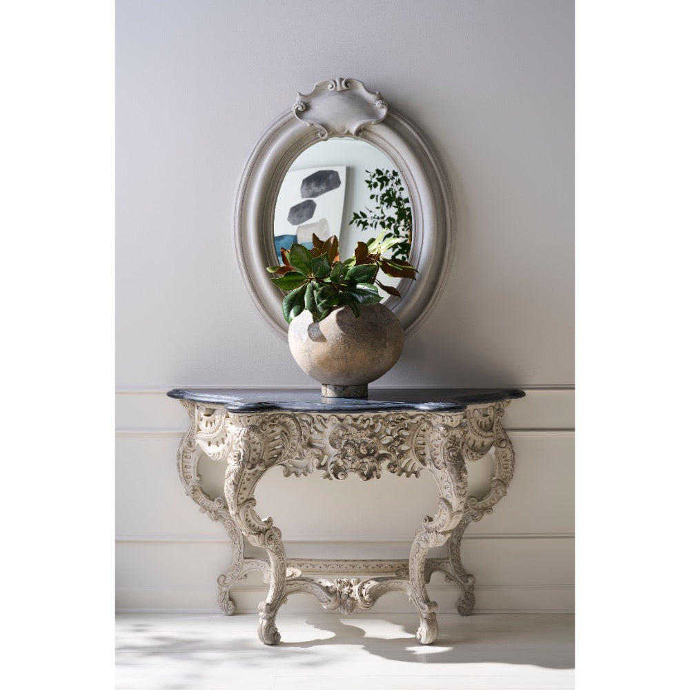 console table French inspired carved base curved legs ivory dark wood top