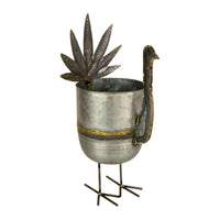 The Kalalou Galvanized Turkey Wine Chiller, featuring a cylindrical body, long neck, fan-like tail, and thin wire legs, makes a charming addition to your Thanksgiving decor.