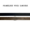 The Art Print Frameless Wood + Steel Hangers from Barloga Studios are displayed in two finishes: black and walnut. Ideal for displaying modern art prints, these elegant hangers seamlessly integrate into any decor while highlighting artwork with a sleek contemporary touch.