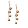 Kalalou's Brass Finished String of Bells (set of 2) features rustic bells on jute twine, ideal as holiday decor.
