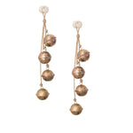 Kalalou's Brass Finished String of Bells (set of 2) features rustic bells on jute twine, ideal as holiday decor.