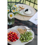 white scalloped melamine serving platters
