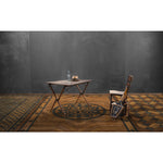 Spicher & Co. vinyl floorcloth floor mat wood inlays star pattern brown black wood area rug