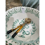 large green white clay bowl